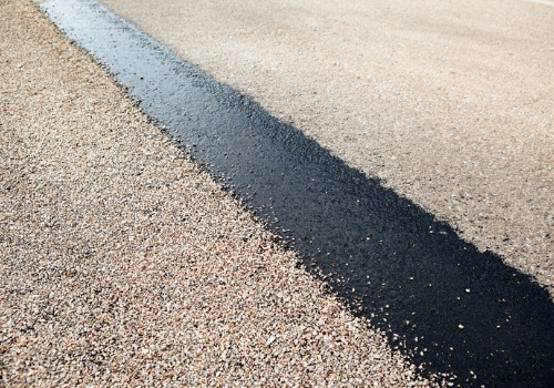 Fresh chip seal on a roadway thanks to Aggregate Chip Spreaders