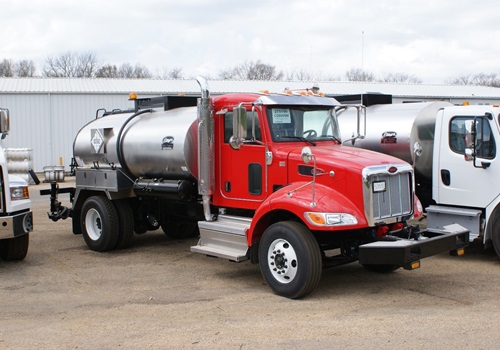 A truck with a sealcoating tank attached, produced by Etnyre